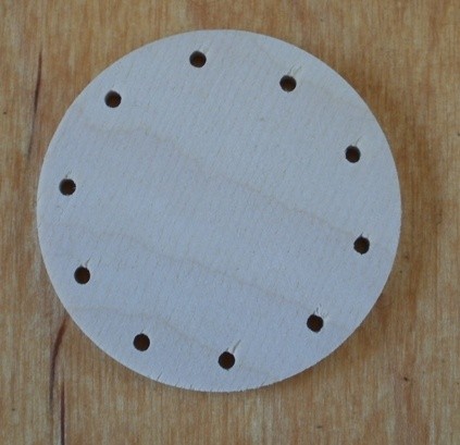 Falap,  kerek,  átmérő 5 cm,  lyuk  2,5 mm